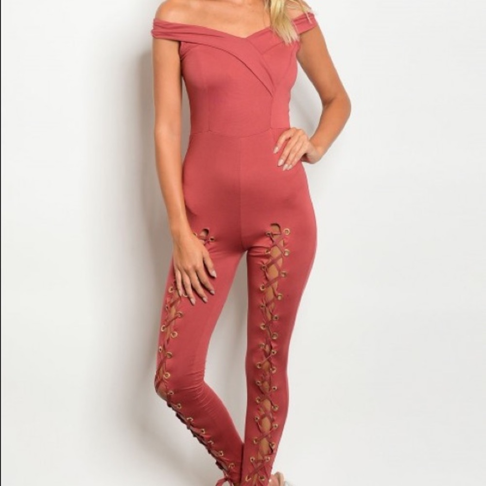 NWOT RUST JUMPSUIT LACE LEGS